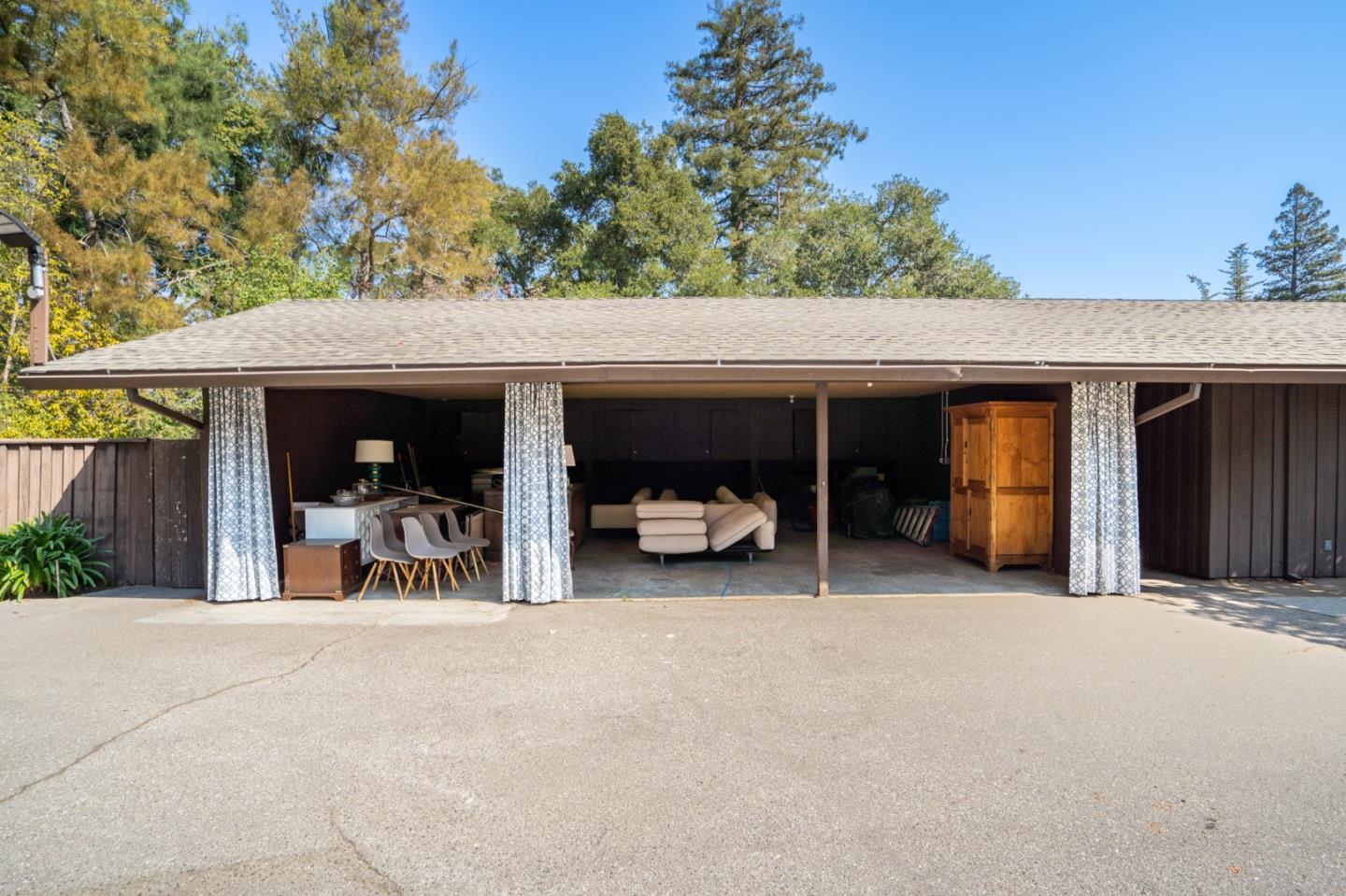 760 Chiltern Road Hillsborough, CA 94010 - Photo 51 of 56 a view of a patio with table and chairs