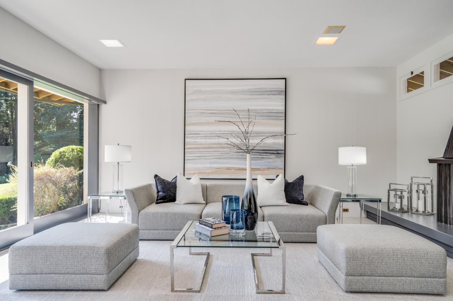 760 Chiltern Road Hillsborough, CA 94010 - Photo 8 of 56 a living room with furniture and a large window