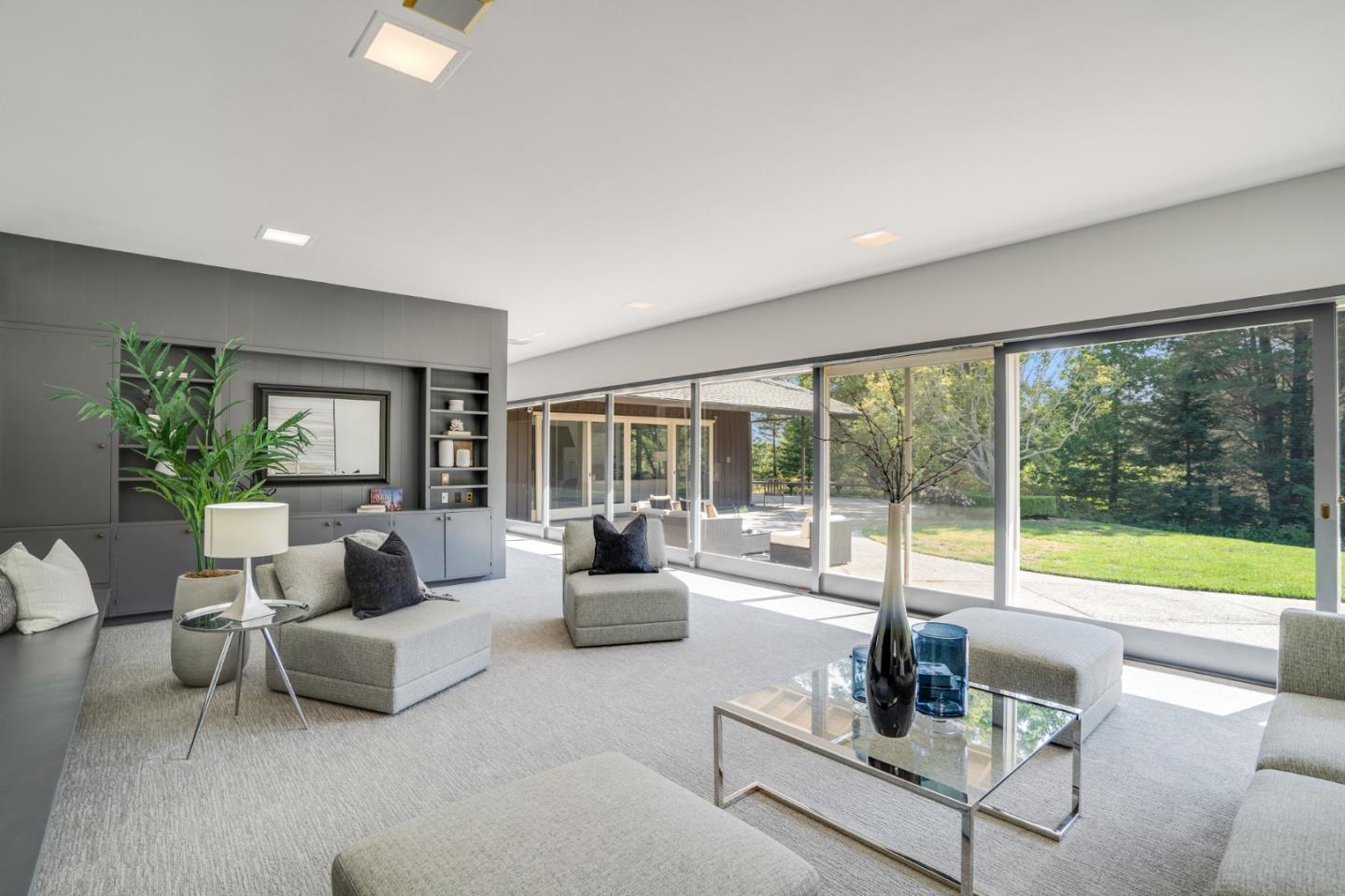 760 Chiltern Road Hillsborough, CA 94010 - Photo 10 of 56 a living room with furniture and a large window