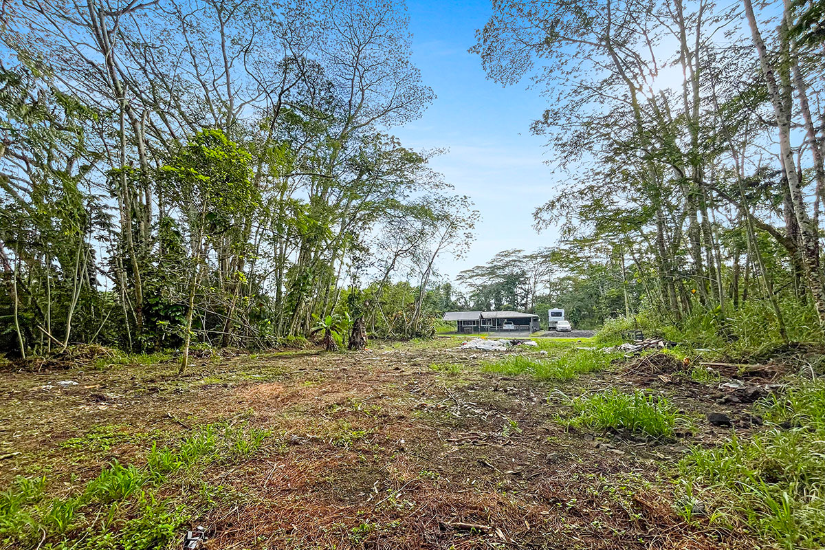 15-2761 South Lot 388 Honu Street Pahoa, HI 96778 - Photo 9 of 23 a backyard of a house with lots of green space