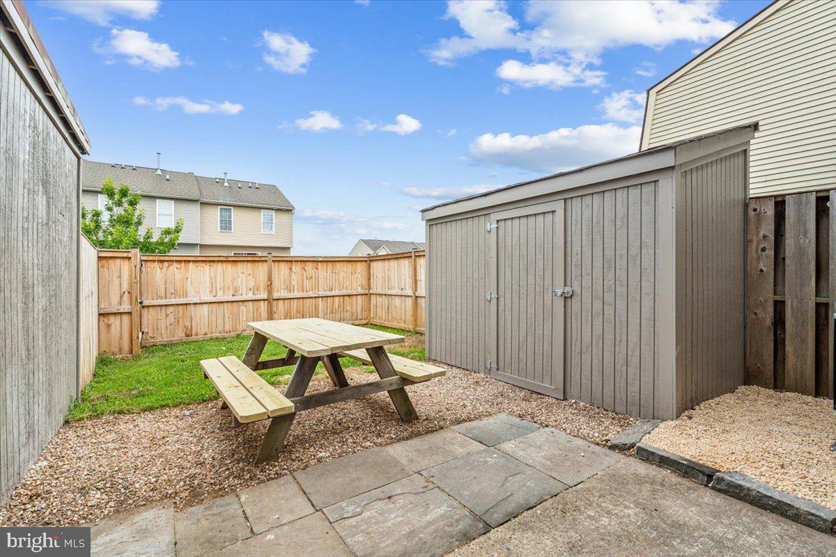 1149 Providence Court Frederick, MD 21703 - Photo 19 of 21 Backyard with storage shed
