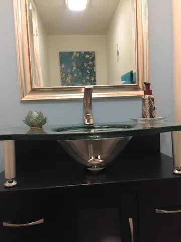 a view of a workspace with furniture