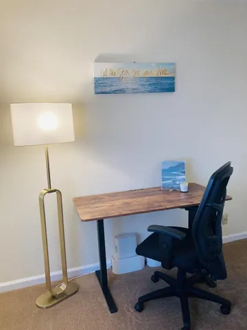 a view of a room with racks on the wall