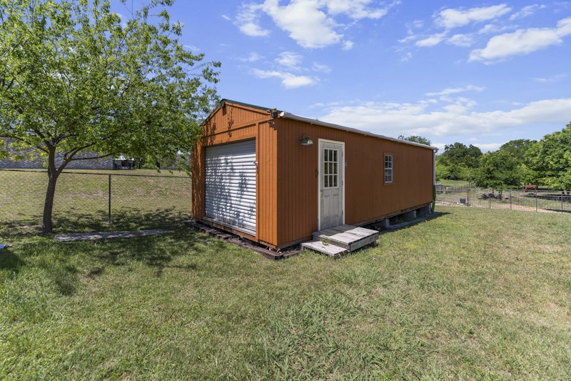 249 County Road 4961 Kempner, TX 76539 - Photo 29 of 31 a view of backyard with large tree and wooden fence