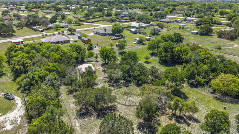 249 County Road 4961 Kempner, TX 76539 - Photo 5 of 31 an aerial view of residential houses with outdoor space and trees