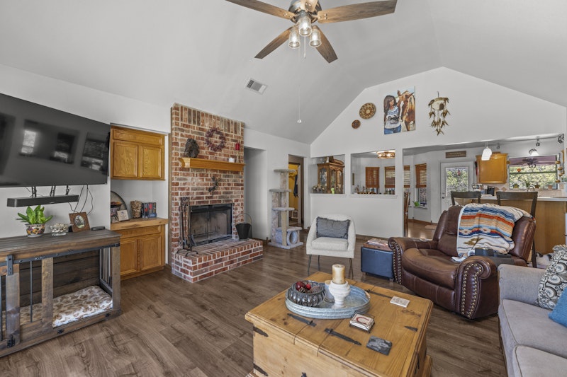 249 County Road 4961 Kempner, TX 76539 - Photo 10 of 31 a living room with furniture and a fireplace