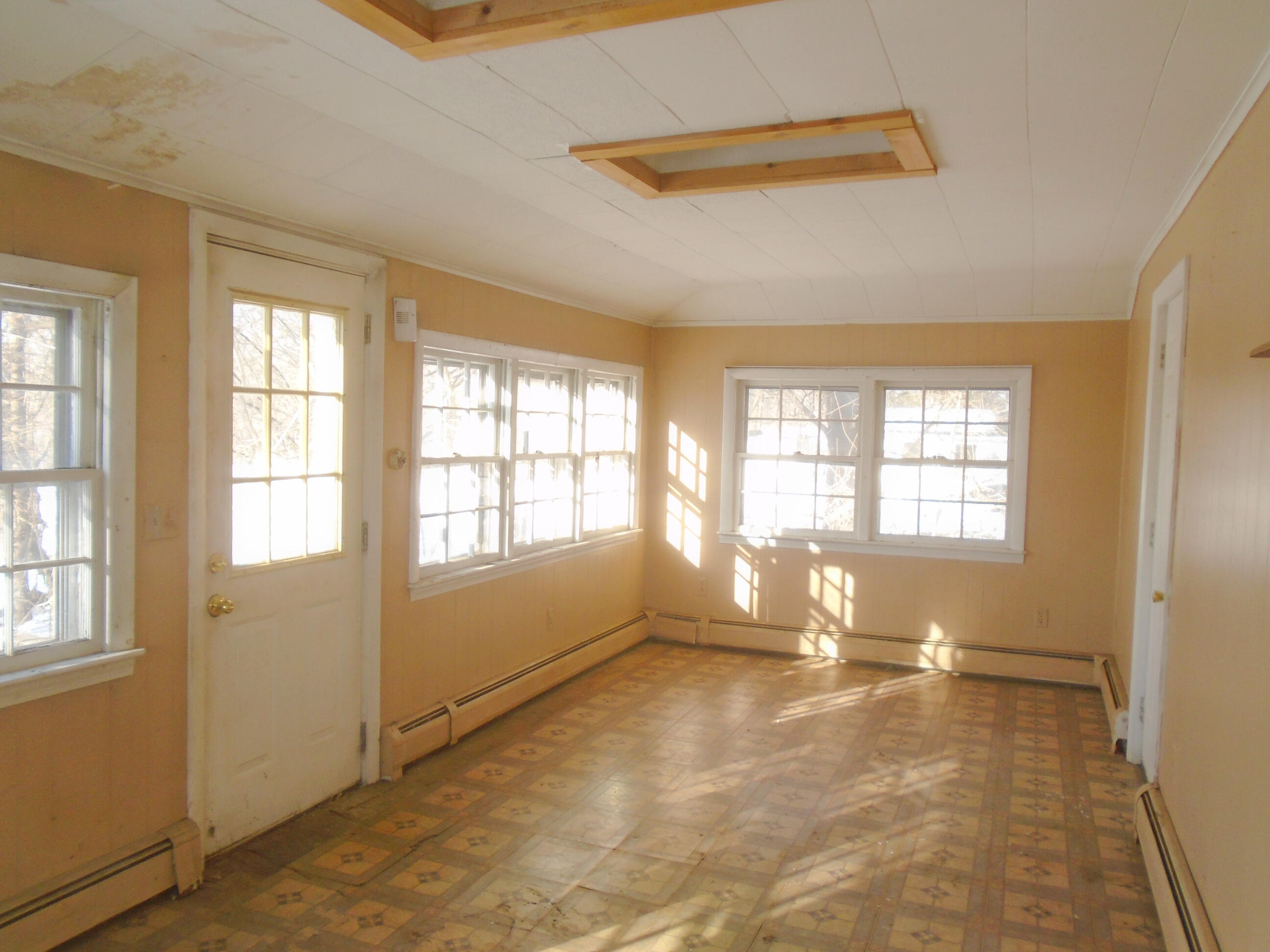 394 Lakewood Road Madison, ME 04950 - Photo 9 of 15 enclosed rear porch