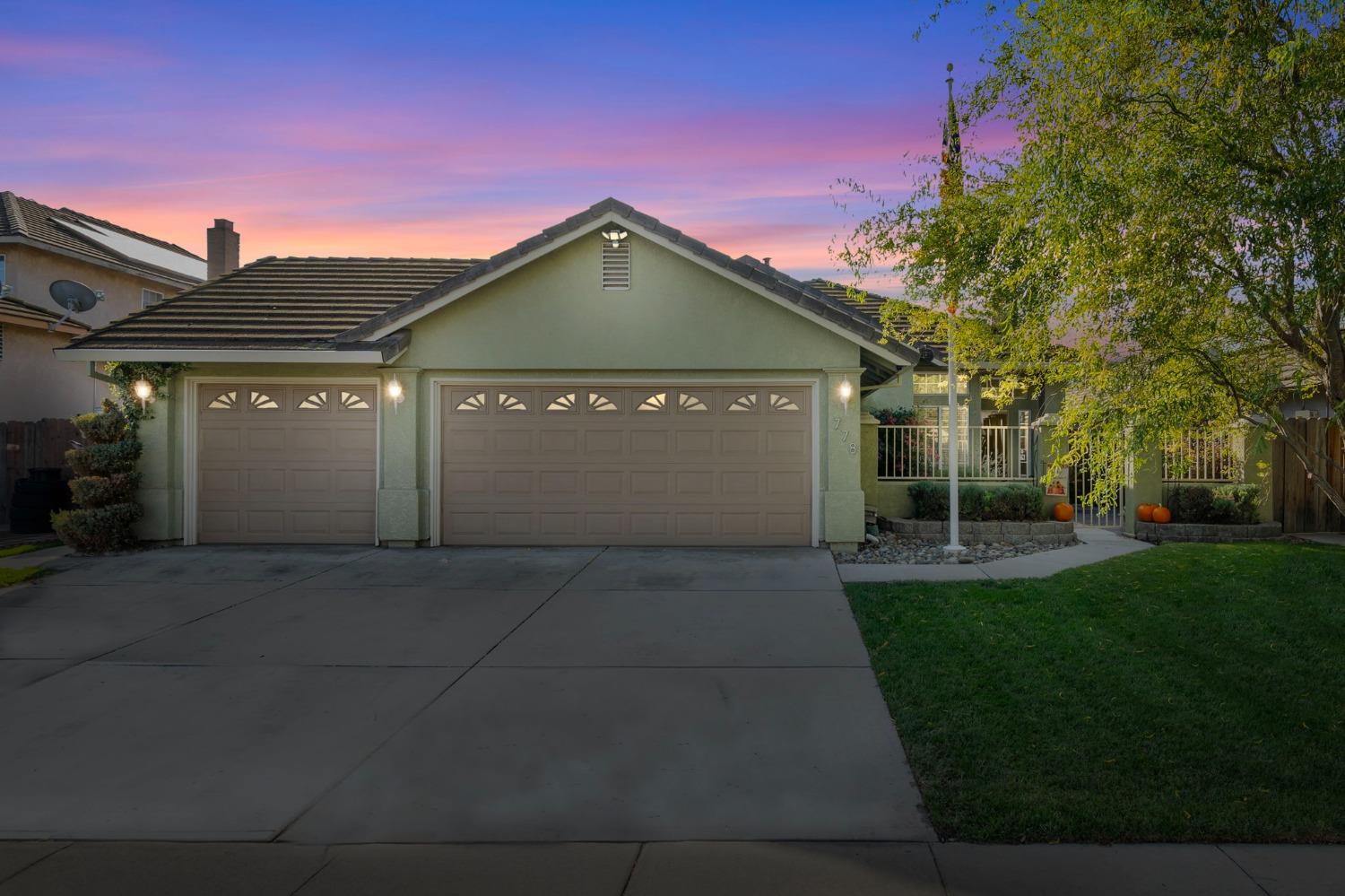 778 Mission Ridge Drive Manteca, CA 95337 - Photo 1 of 1 a front view of a house with yard