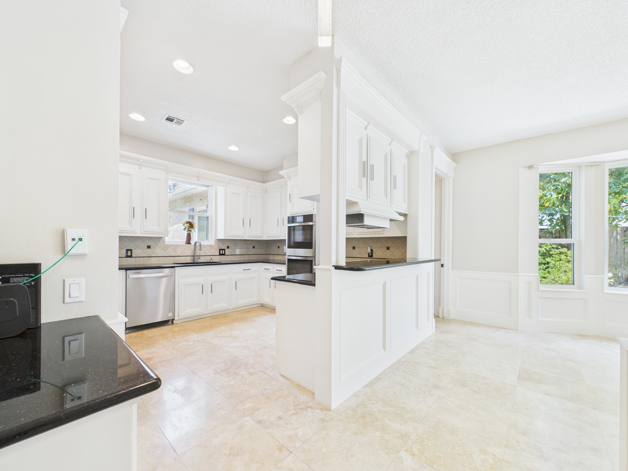 702 Daria Court Houston, TX 77079 - Photo 8 of 44 Clean and Efficient Kitchen with Breakfast Bar & Small Work Area