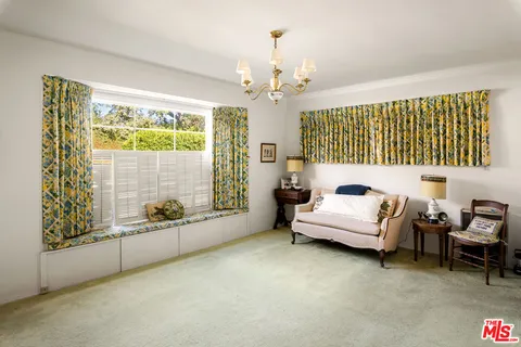 a workspace with furniture and rug