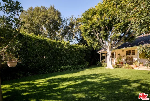 a view of swimming pool with a patio