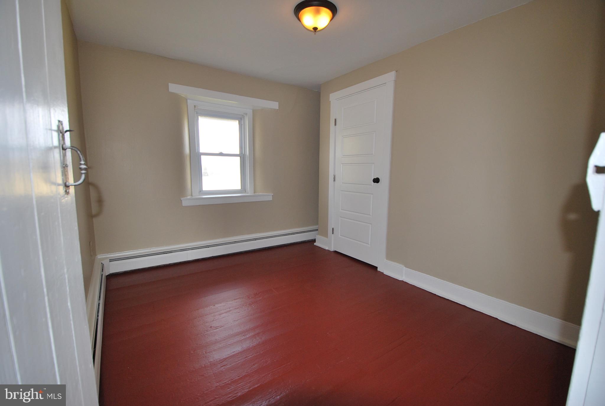 592 Blake Road Elkton, MD 21921 - Photo 15 of 18 an empty room with window and windows