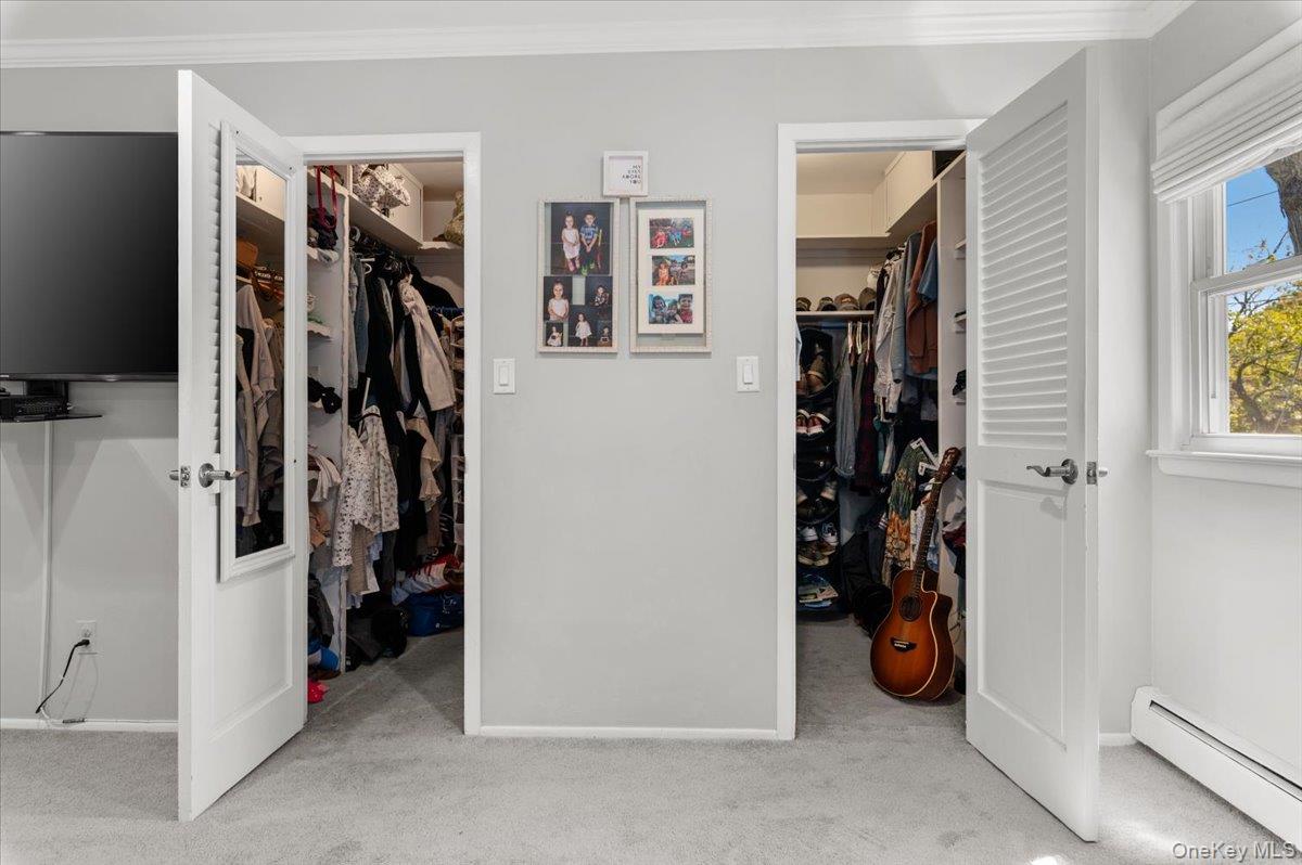 61 Winthrop Road Plainview, NY 11803 - Photo 16 of 37 a view of a livingroom with closet and a window