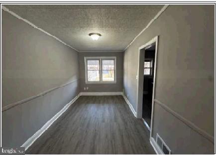 133 Riverthorn Road Middle River, MD 21220 - Photo 5 of 5 a view of hallway with window and wooden floor