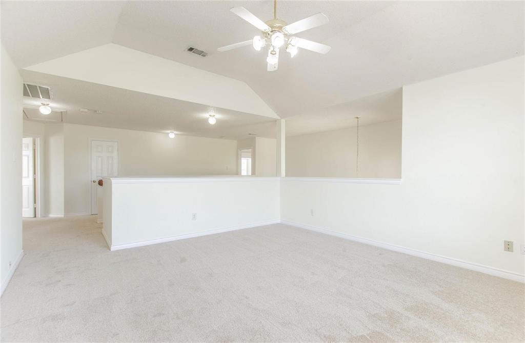 4136 Los Altos Drive Plano, TX 75024 - Photo 15 of 31 an empty room with a ceiling fan and a window