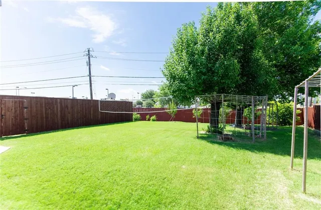 a view of a yard with a slide