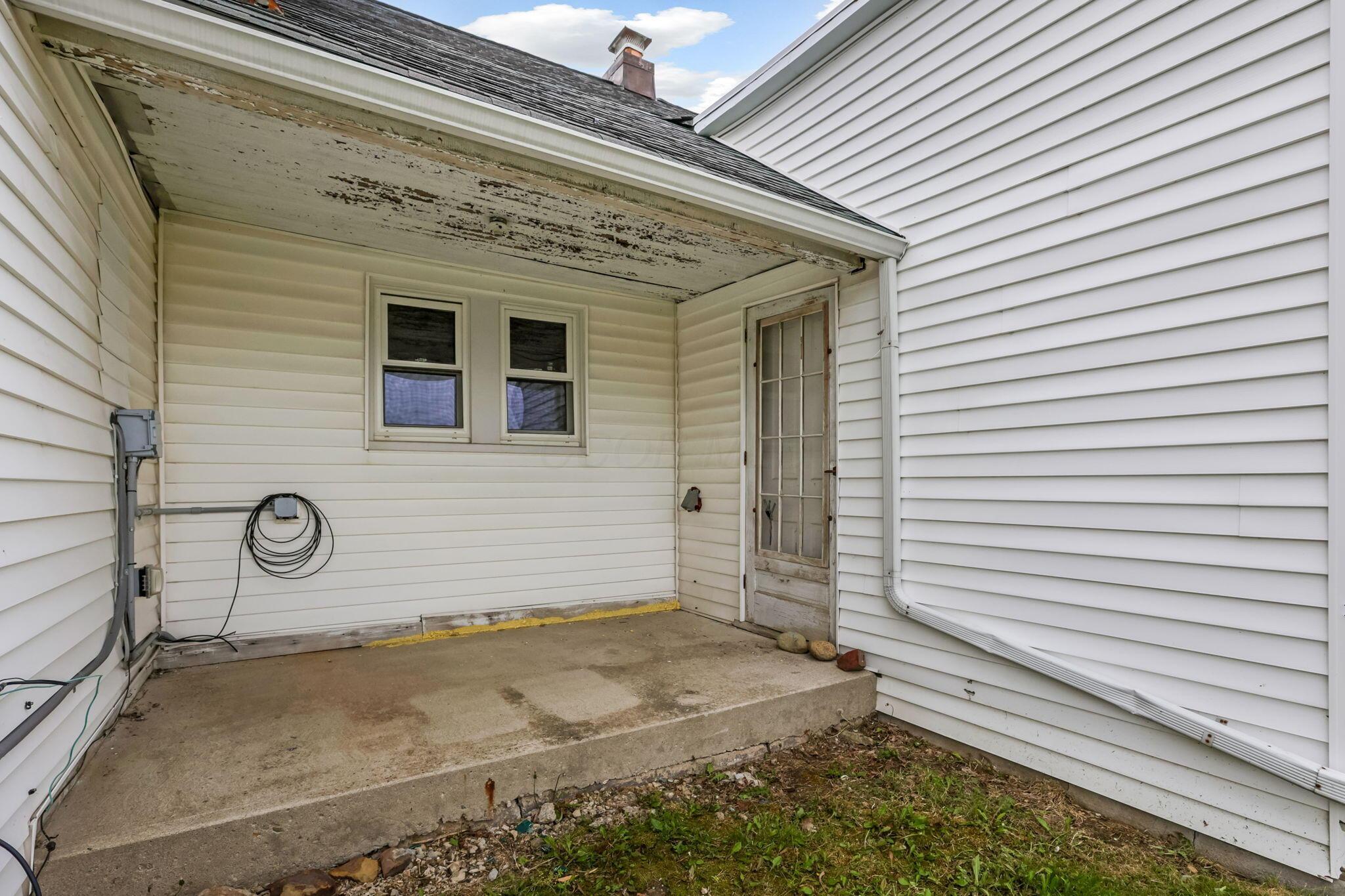 5919 North County Line Road Sunbury, OH 43074 - Photo 58 of 66 Side porch leads to potential mud room space