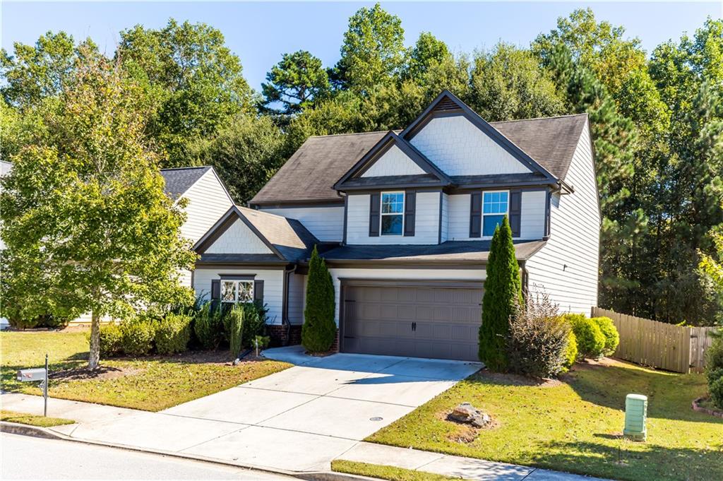 4245 Pear Haven Lane Gainesville, GA 30504 - Photo 1 of 39 a front view of a house with a yard