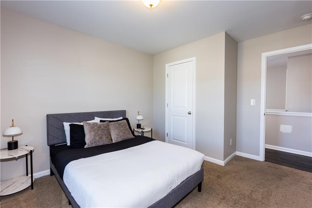 4245 Pear Haven Lane Gainesville, GA 30504 - Photo 36 of 39 a bedroom with a bed and window