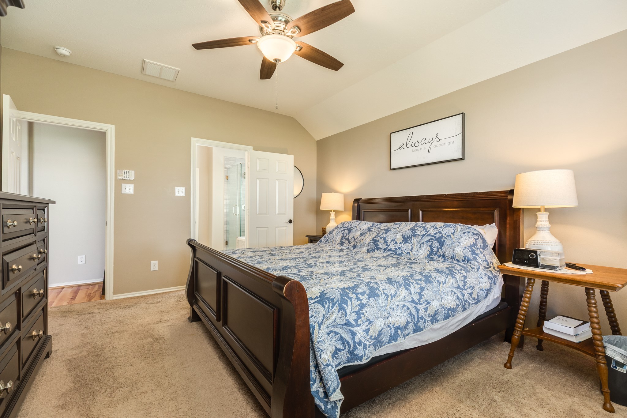 13808 Stark Bridge Lane Rosharon, TX 77583 - Photo 15 of 39 Spacious primary bedroom suite located at the rear of the home for enhanced privacy. Recently updated with fresh paint and a new ceiling fan, this retreat sits conveniently adjacent to the main family area.