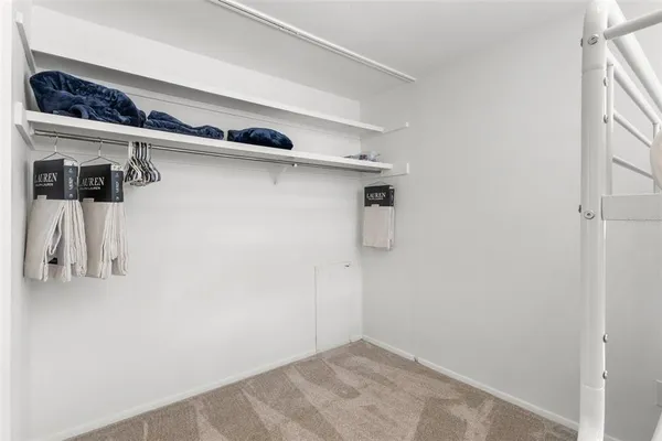 a view of a walk in closet