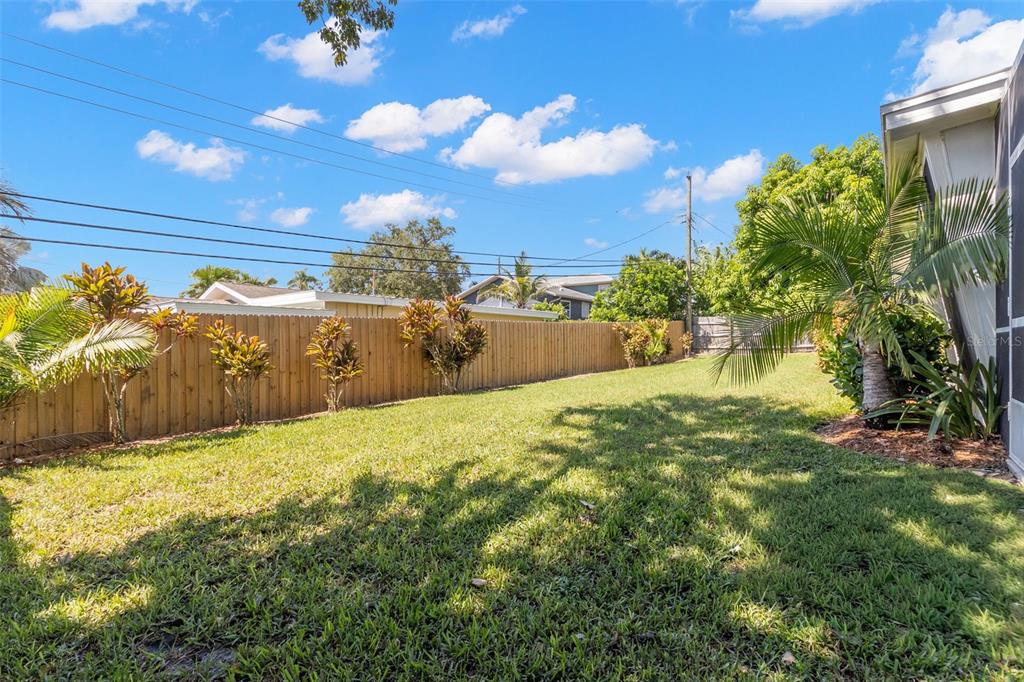 3488 Shady Bluff Drive Largo, FL 33770 - Photo 25 of 29 a view of yard with swimming pool