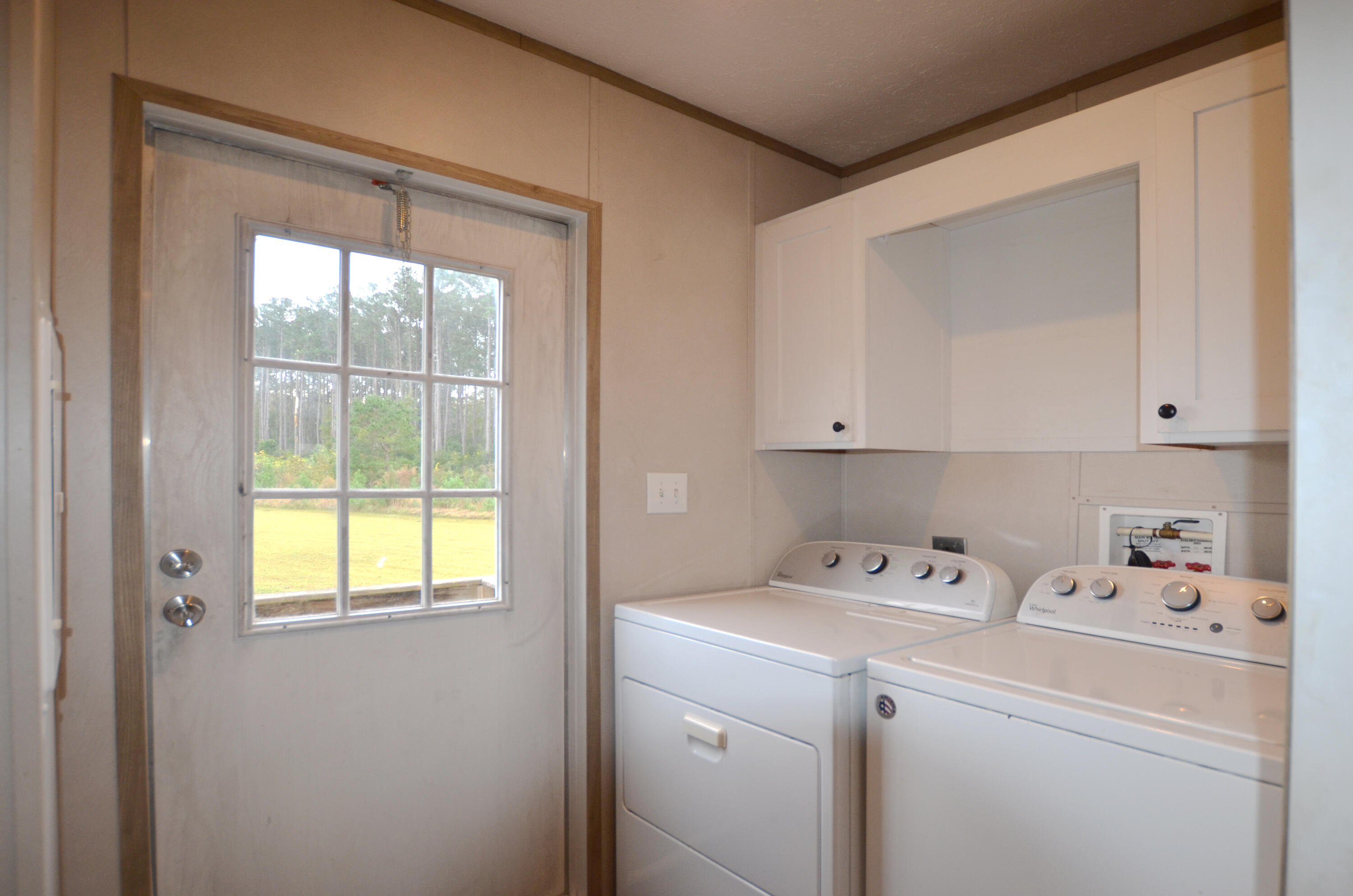 1675 River Road McClellanville, SC 29458 - Photo 15 of 16 15-Laundry