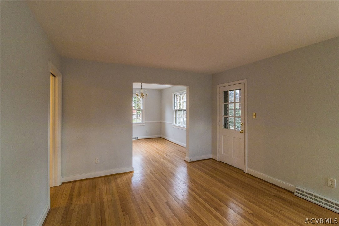 1214 Whitby Road Richmond, VA 23227 - Photo 8 of 26 Living room looking into the dining room and door