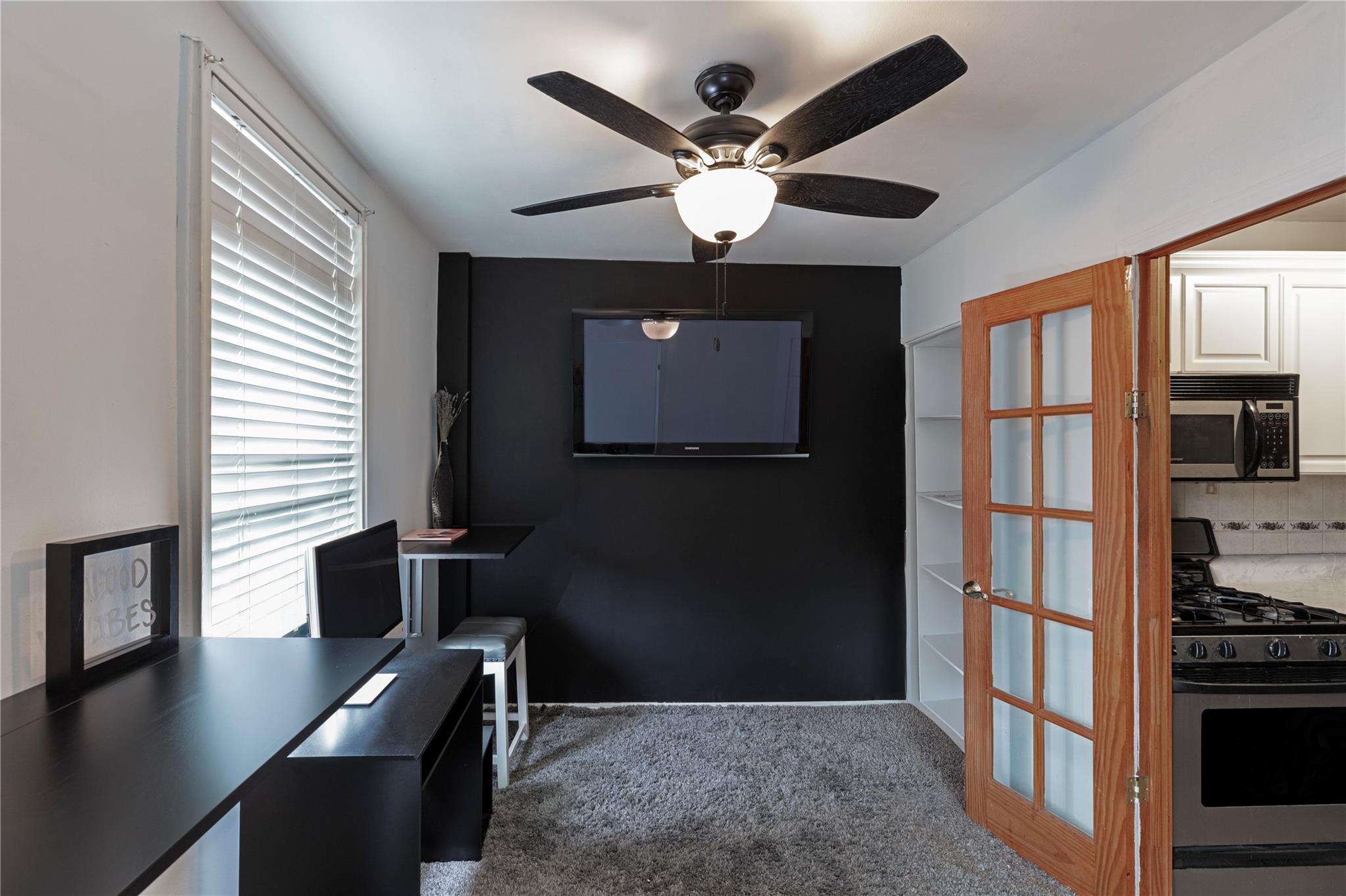 58-03 Calloway Street, Unit 3NN Queens, NY 11368 - Photo 11 of 23 a view of a livingroom with workspace and a window