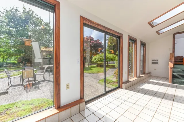 a view of a street with an outdoor seating