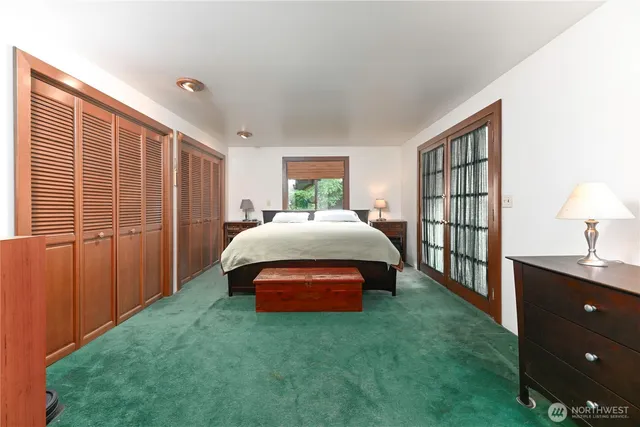 a view of bathroom with a toilet and a sink
