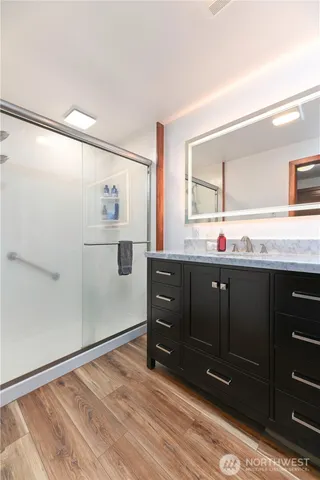 a view of a bedroom with washer and dryer