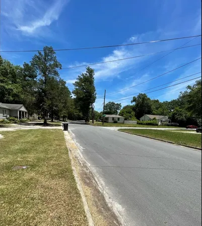 a view of street with houses
