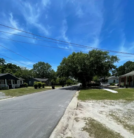 a view of a swimming pool with an outdoor space and seating area