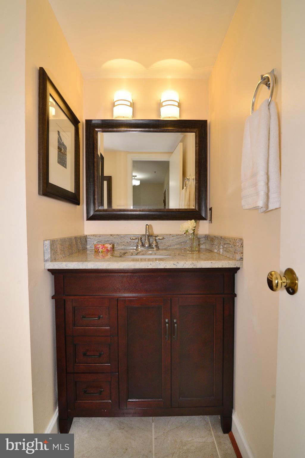 11086 Glade Court Reston, VA 20191 - Photo 21 of 44 The updated powder room - located off of the foyer