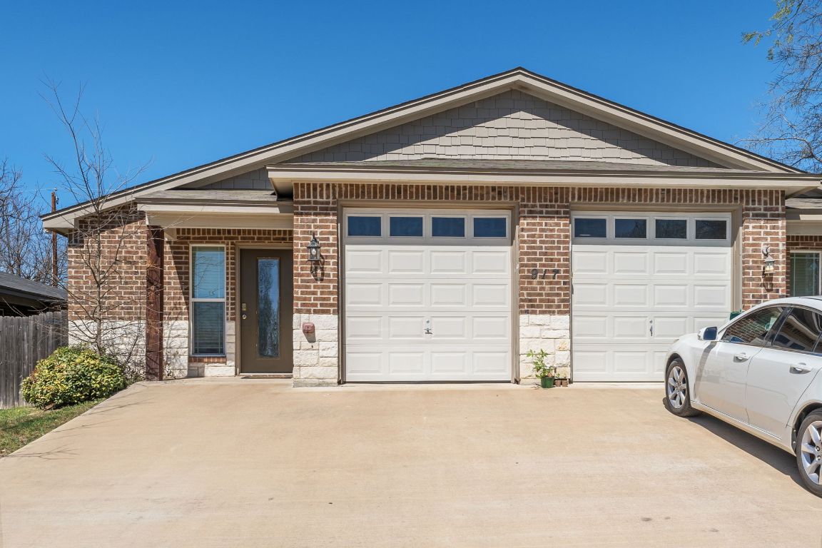 917 Ramblewood Street, Unit B Harker Heights, TX 76548 - Photo 1 of 39 a front view of a house with a yard