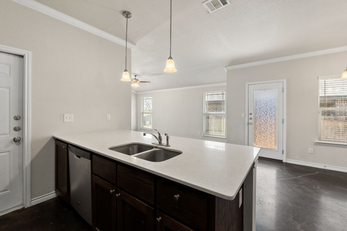 917 Ramblewood Street, Unit B Harker Heights, TX 76548 - Photo 11 of 39 a kitchen with sink cabinets and wooden floor