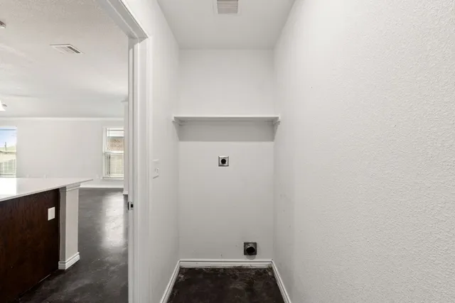 a kitchen with a stove and a microwave