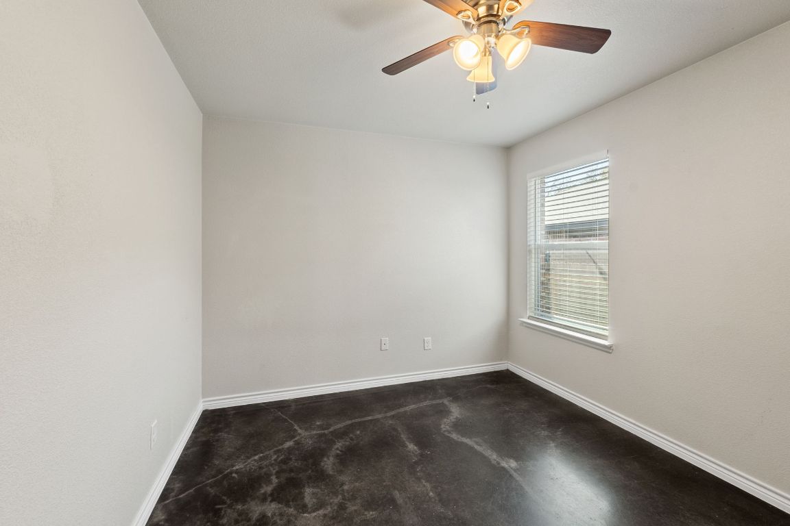 917 Ramblewood Street, Unit B Harker Heights, TX 76548 - Photo 17 of 39 an empty room with a window and a fan