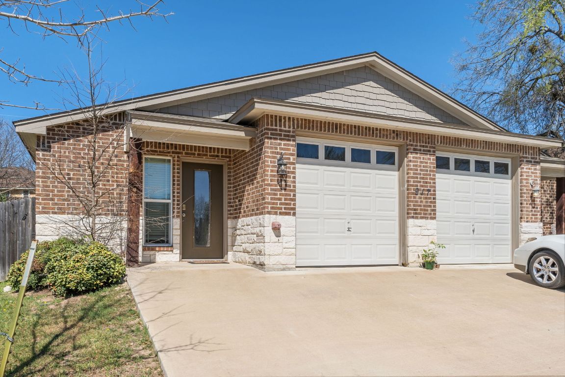 917 Ramblewood Street, Unit B Harker Heights, TX 76548 - Photo 2 of 39 a front view of a house with a garage