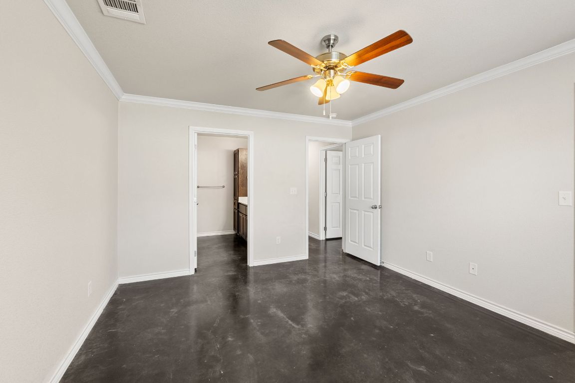 917 Ramblewood Street, Unit B Harker Heights, TX 76548 - Photo 24 of 39 an empty room with a ceiling fan and a window