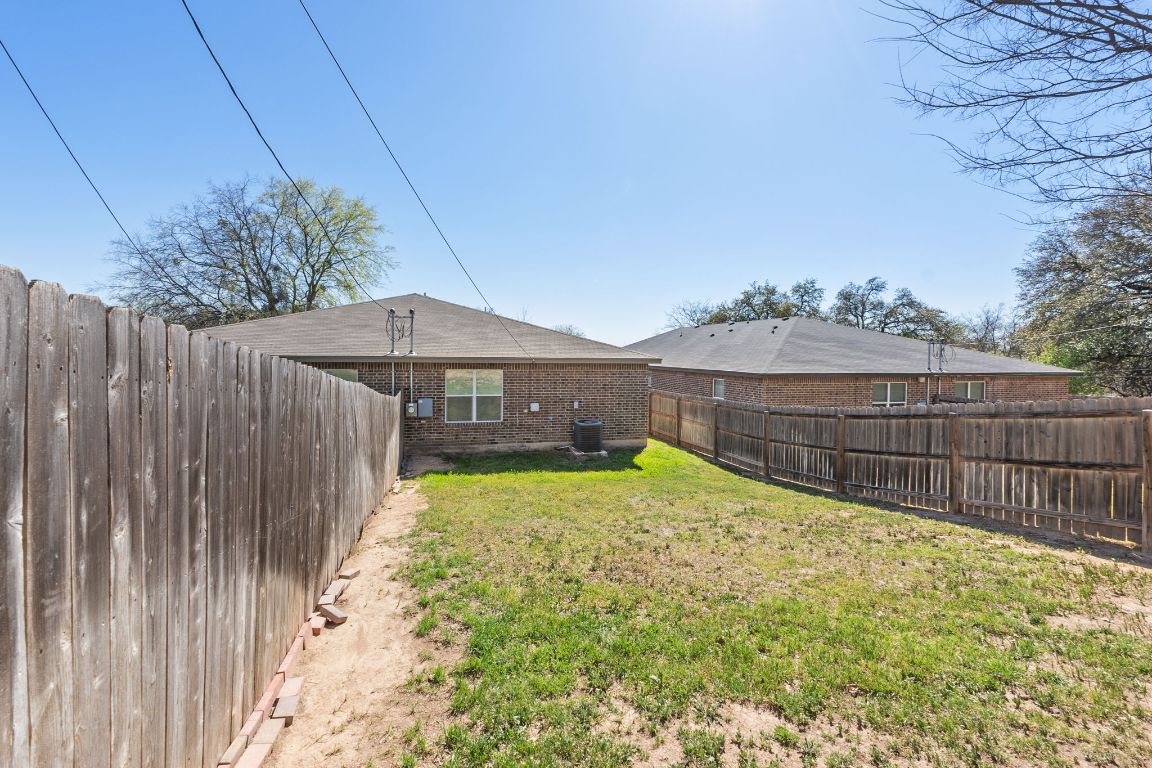 917 Ramblewood Street, Unit B Harker Heights, TX 76548 - Photo 37 of 39 a view of a backyard with wooden fence