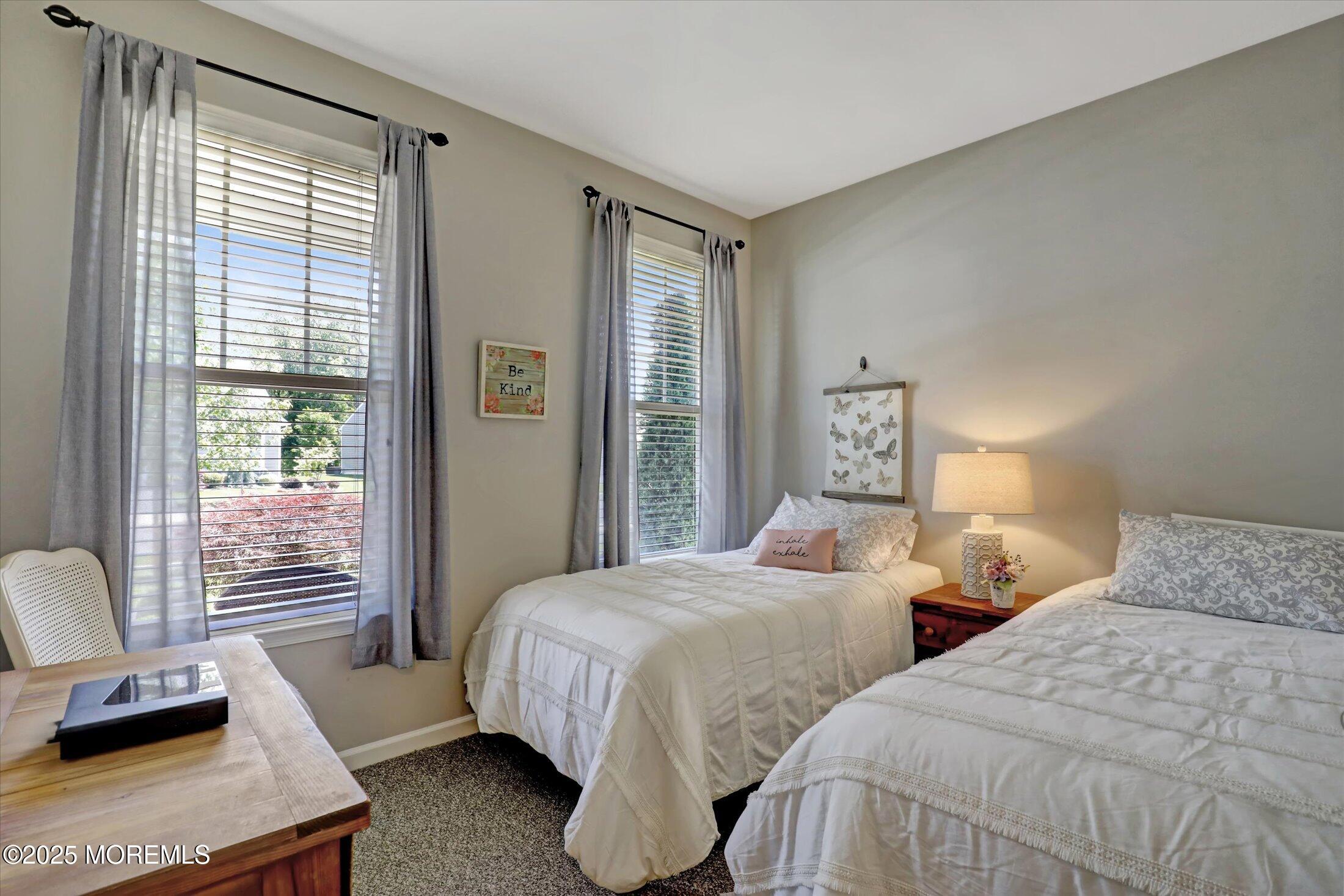 24 Moonlight Way Howell, NJ 07731 - Photo 25 of 34 a bedroom with two beds and large window