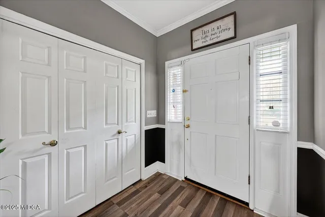 a view of a livingroom with wooden floor