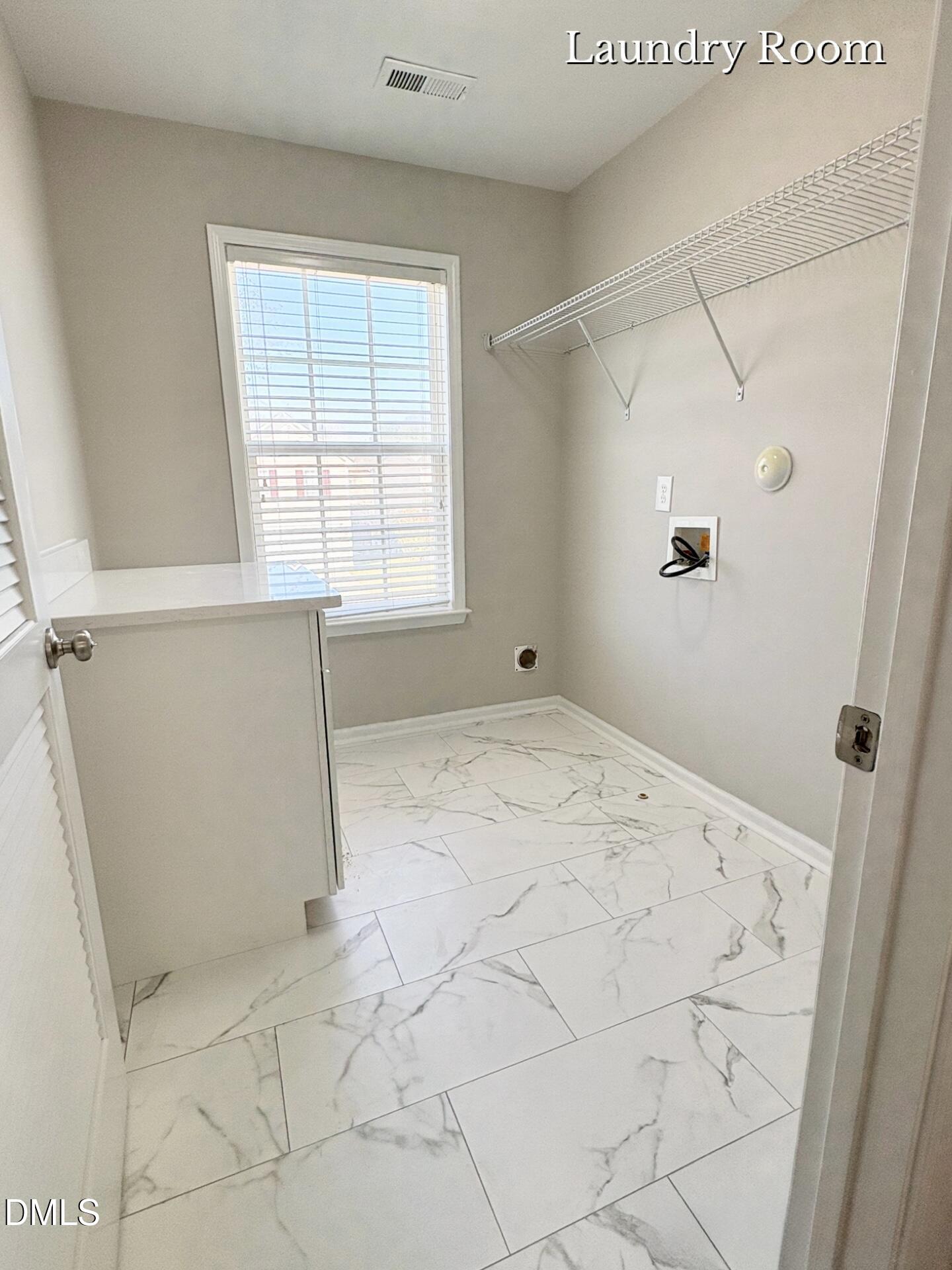 740 Stackhurst Way Wake Forest, NC 27587 - Photo 8 of 16 Laundry Room