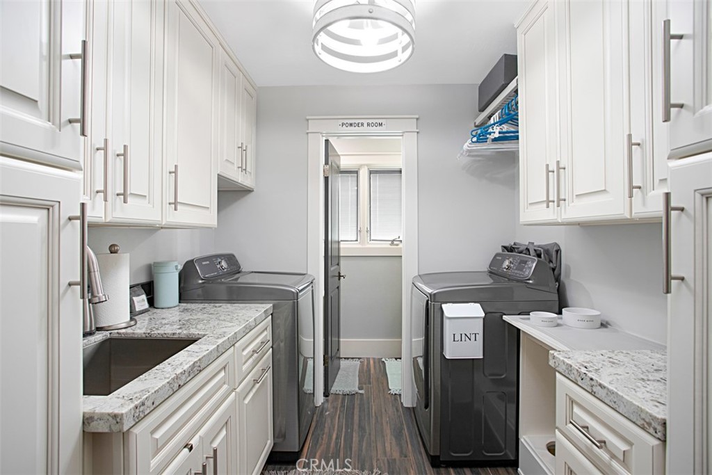 40791 Daily Road Fallbrook, CA 92028 - Photo 11 of 41 a kitchen with stainless steel appliances granite countertop a sink stove and refrigerator