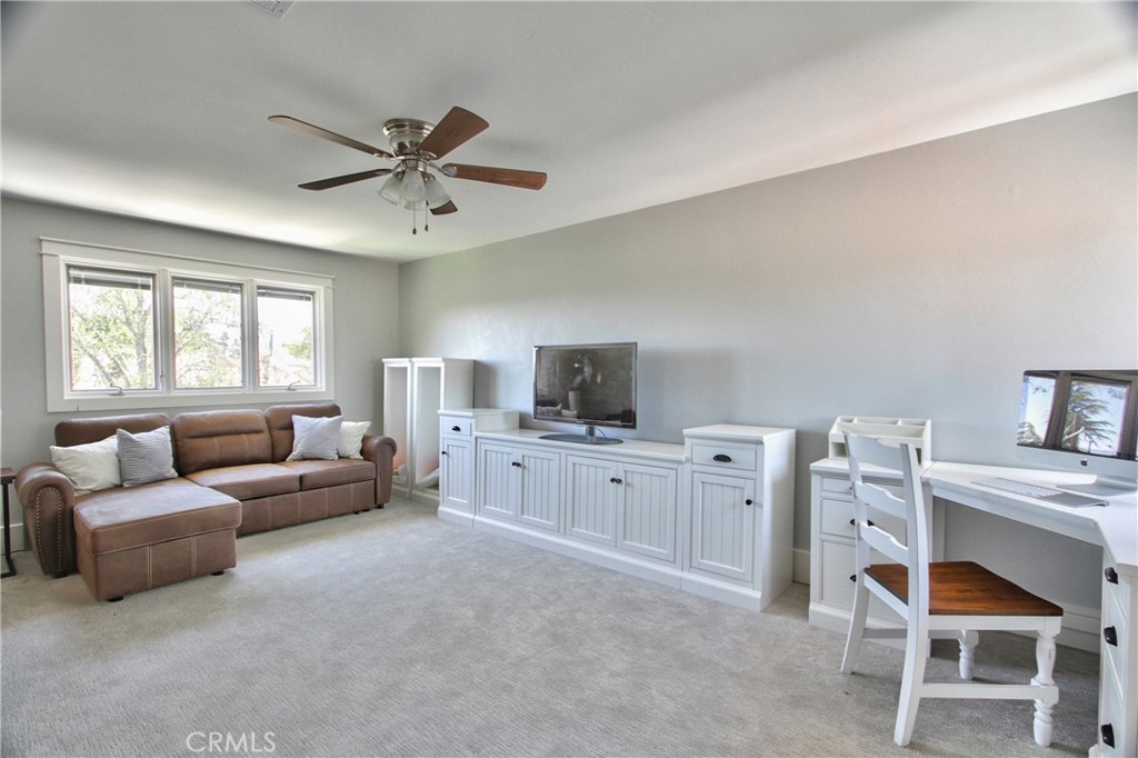 40791 Daily Road Fallbrook, CA 92028 - Photo 19 of 41 a living room with furniture and a flat screen tv
