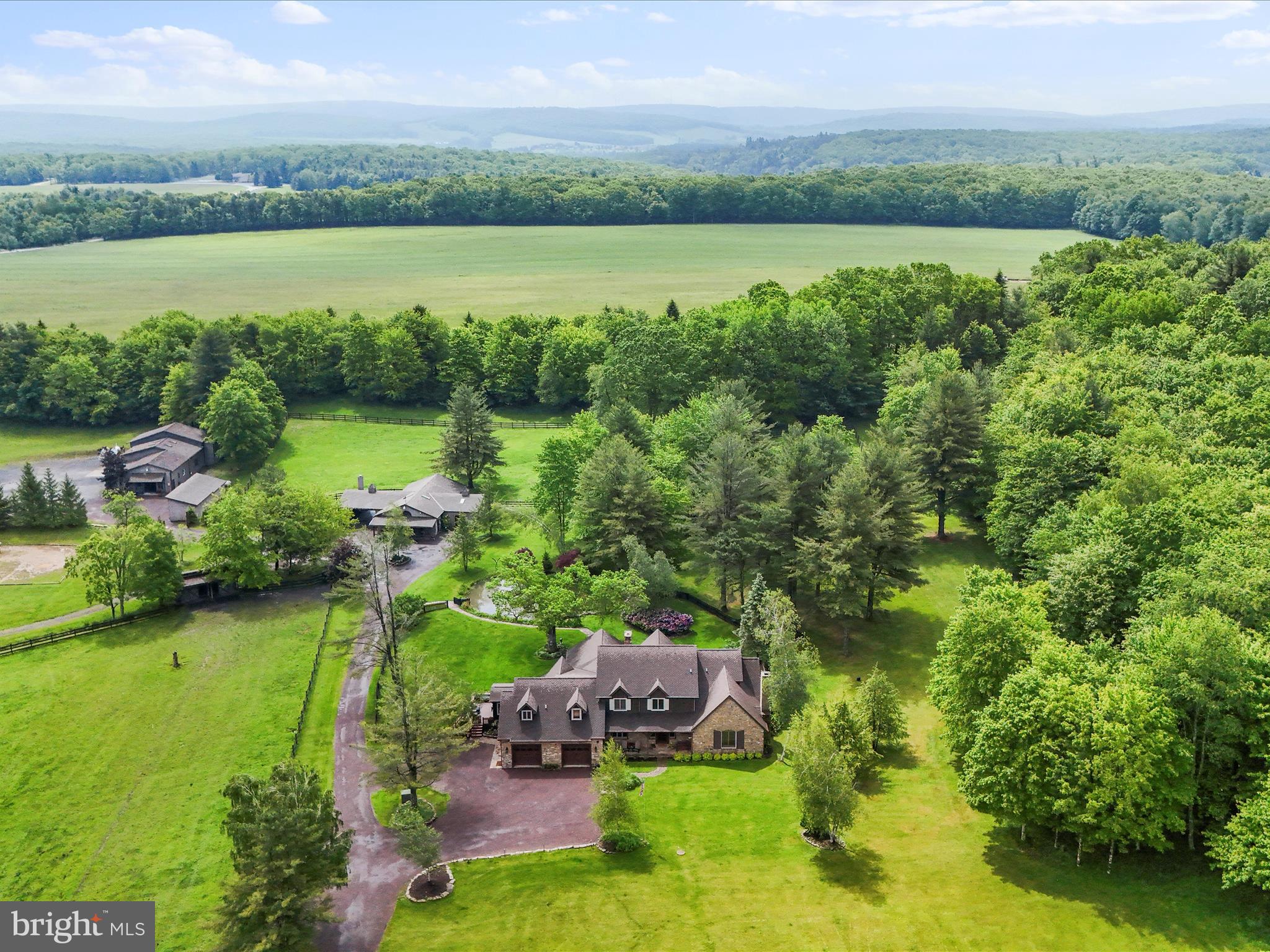 1240 Boy Scout Road Oakland, MD 21550 - Photo 137 of 148 a view of a lake with houses in the back