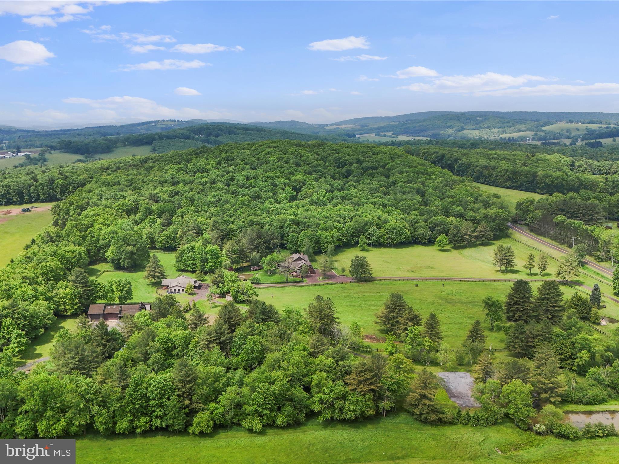 1240 Boy Scout Road Oakland, MD 21550 - Photo 139 of 148 a view of a lush green outdoor space with a lake view