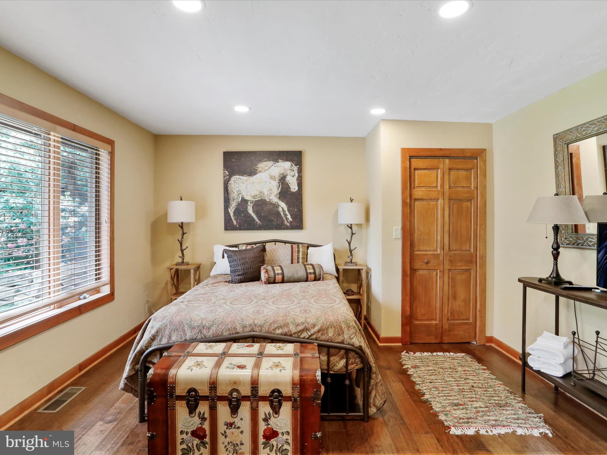 1240 Boy Scout Road Oakland, MD 21550 - Photo 43 of 148 a bedroom with a bed and a window